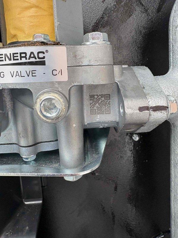 Performed Generac safety inspection in accordance with SIB25-22-H requirements. Inspected gas valve assembly and identified the need for part replacement. Installed warranty part A0009578206 from stock to resolve the safety issue. Documented condition with photos showing the valve installation and proper mounting configuration.