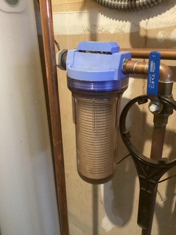 Performed annual maintenance service on ClimateMASTER geothermal system (21 years old) and Steibel Eltron tankless water heater (3 years old). Replaced RO filtration cartridge in water treatment system and inspected circuit board showing signs of corrosion/burn damage in control module that will require follow-up attention.