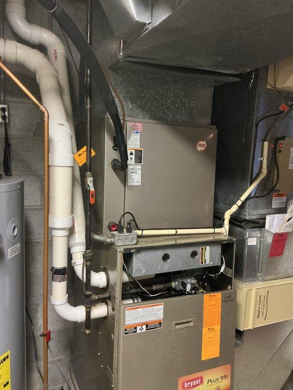 Conducted furnace estimate appointment in response to client's request for replacement options. Existing Bryant PLUS 95i gas furnace system was evaluated, including connected ductwork, PVC ventilation/drainage components, and thermostat functionality. Provided comprehensive replacement quote after client declined repair option, and client elected to proceed with new furnace installation.