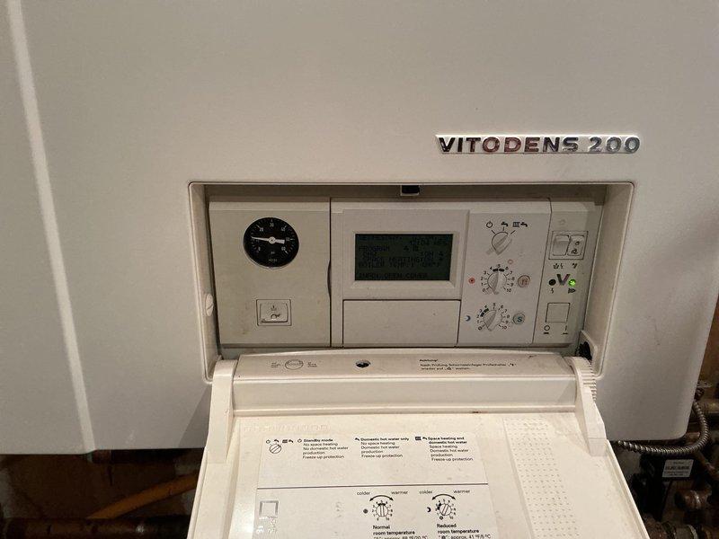 Completed a boiler estimate at customer's residence, examining a Vitodens 200 system that's unable to maintain pressure. Evaluated the current hydronic setup with multiple zones and discussed options including potential conversion to a forced air furnace system. Customer was presented with replacement and conversion alternatives based on assessment of the aging boiler and existing distribution infrastructure.
