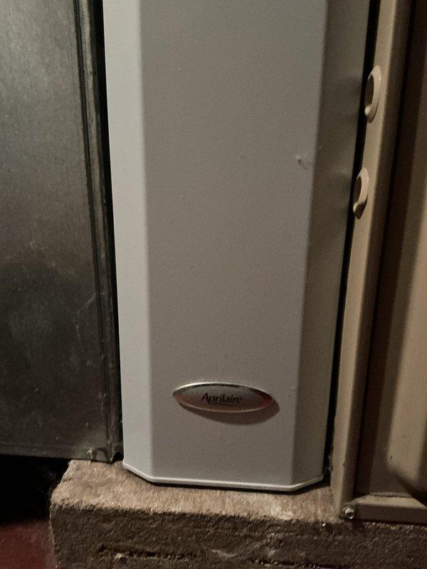 Performed furnace replacement estimate for customer who is currently using 4 space heaters as temporary heating solution. Documented existing HVAC system components including an Aprilaire air quality system and the current plumbing configuration with PVC and copper piping that would need to be integrated with any new installation.