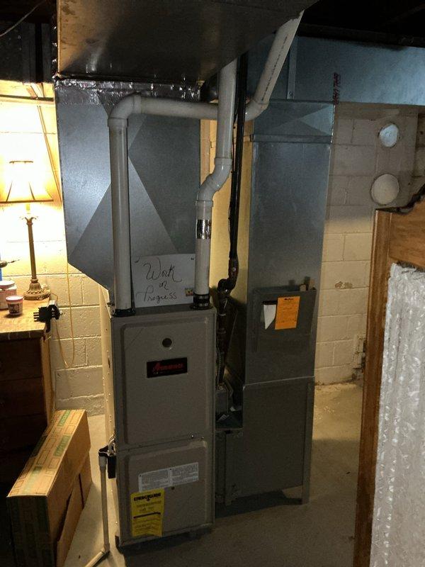 Successfully completed FAAC-Furnace/Add AC installation in basement utility room, with proper ductwork connections and PVC ventilation/drainage pipes installed. Electrical connections were properly made to the circuit breaker panel, with appropriate breakers installed for the new HVAC system. Work was coordinated with on-site painters to ensure access while maintaining a "Work in Progress" status for the project.