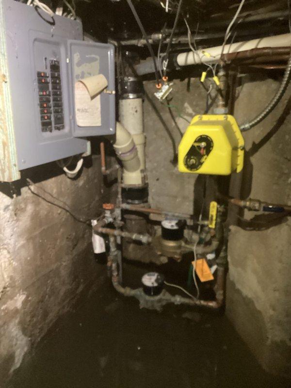 Responded to no heat call on approximately 16-year-old Lochinvar boiler system. Upon arrival, conducted visual inspection of mechanical room and heating equipment. Photographed existing plumbing assembly, electrical panel, and associated mechanical components including circulator pumps, zone valves, and piping configuration. Documented current system condition showing age-related corrosion on copper piping and moisture staining on concrete floor beneath equipment. Verified electrical connections and control wiring to yellow-cased control unit. System assessment completed and customer advised of findings.