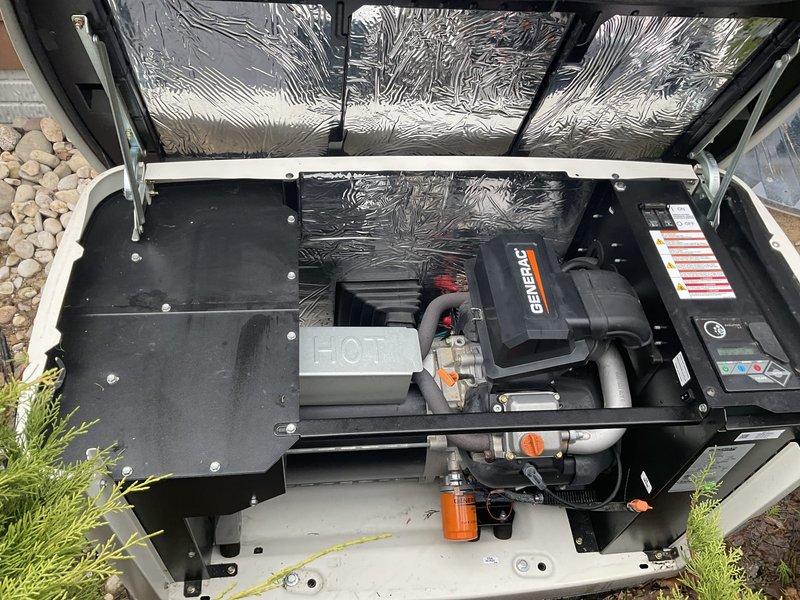 Completed annual inspection on Generac generator unit. Accessed internal components by removing top panel to perform comprehensive visual assessment of mechanical and electrical systems. Inspected motor/compressor assembly, capacitors, electrical connections, wiring harness, and mounting hardware for proper operation and signs of wear. Examined fuel line connections, hoses, and fittings for leaks or deterioration. Verified insulation material and housing integrity. Documented current condition of all accessible components through photographic records. Generator model and serial number information required for complete service documentation and will need to be obtained for records update.