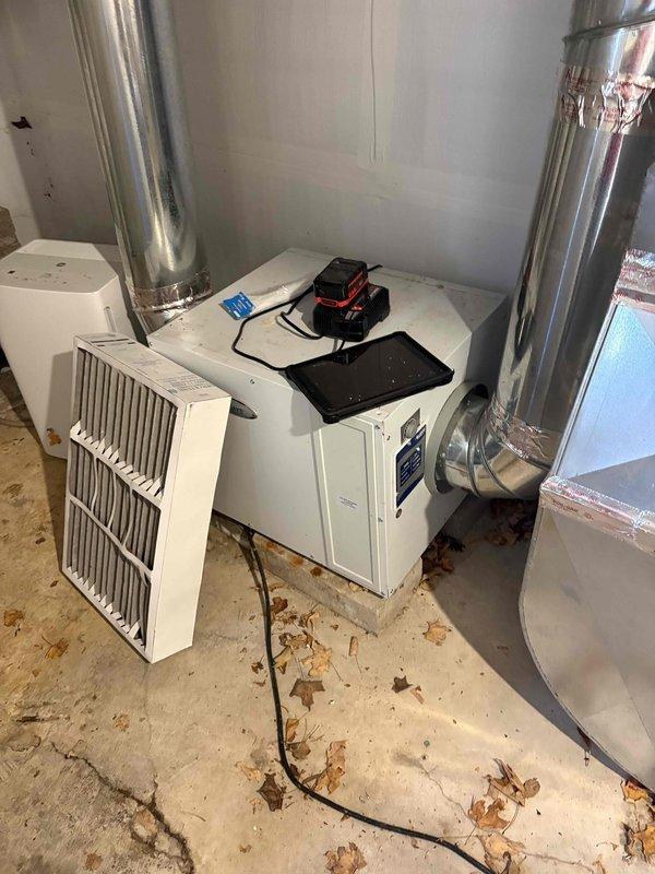 Responded to customer report of low indoor humidity levels. Performed system inspection and documented humidifier installation location with photographs showing air handler unit, ductwork configuration, and supply register measurements. Forwarded documentation as requested for further assessment of humidification system performance.