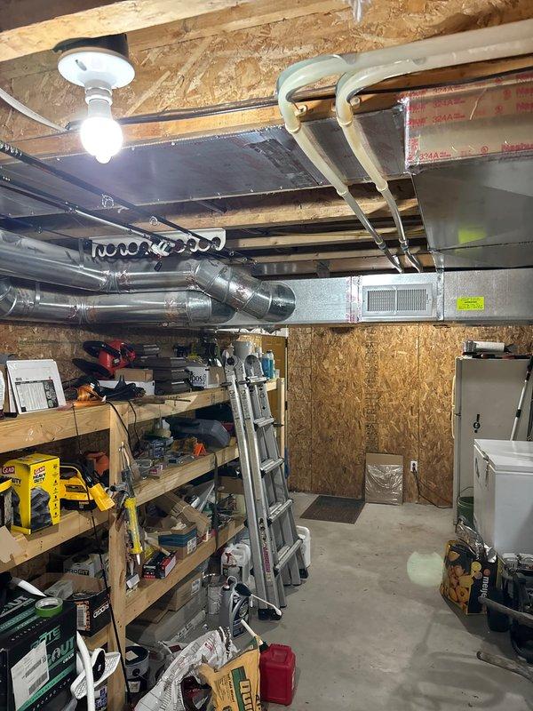 Conducted on-site estimate for natural gas line installation to serve three outdoor appliances: gas grill, fireplace, and fire pit. Assessed existing gas infrastructure in unfinished basement utility area, documented current mechanical systems including exposed plumbing, ductwork, and electrical components, and determined routing requirements for new gas lines to reach exterior locations.