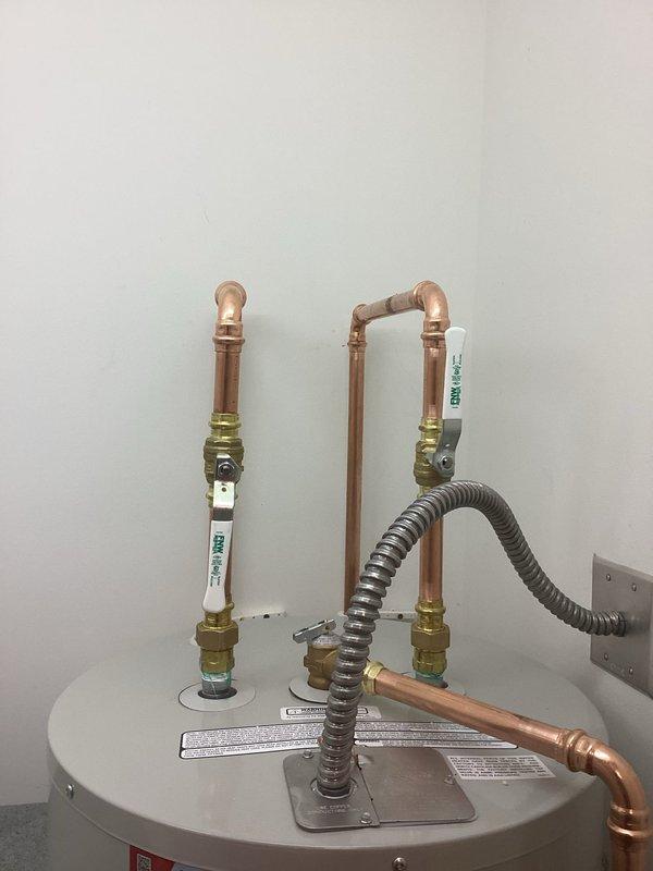 Successfully installed a 40-gallon electric tall water heater as quoted. The unit was received from Ferguson, staged in the shop, and then transported to the site for installation. All copper supply line connections were completed with proper brass compression fittings and shut-off valves, and the flexible connector was installed according to code specifications.