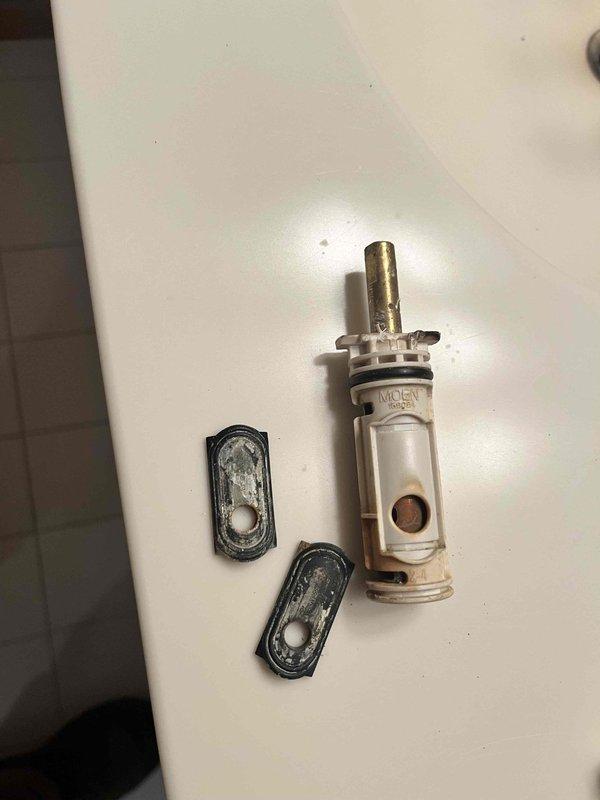 Completed annual cottage turn-on service including full system activation and plumbing inspection. Disassembled, cleaned, and rebuilt Moen faucet cartridge assembly due to mineral buildup and deterioration of internal components, replacing worn O-rings, gaskets, and seals to restore proper function. Coordinated arrival time as requested and consulted with property owner regarding optimal thermostat settings for the season.