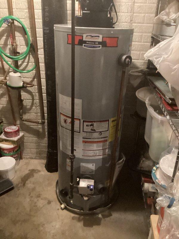 Responded to warranty water heater replacement service. Accessed property through side door as arranged and contacted customer upon arrival. Documented existing Proline FE water heater with photographs of nameplate and unit condition to process warranty claim directly with AWH for return authorization number. Completed labor-only warranty replacement of failed water heater unit in basement utility area. Total labor time 2.5 hours.