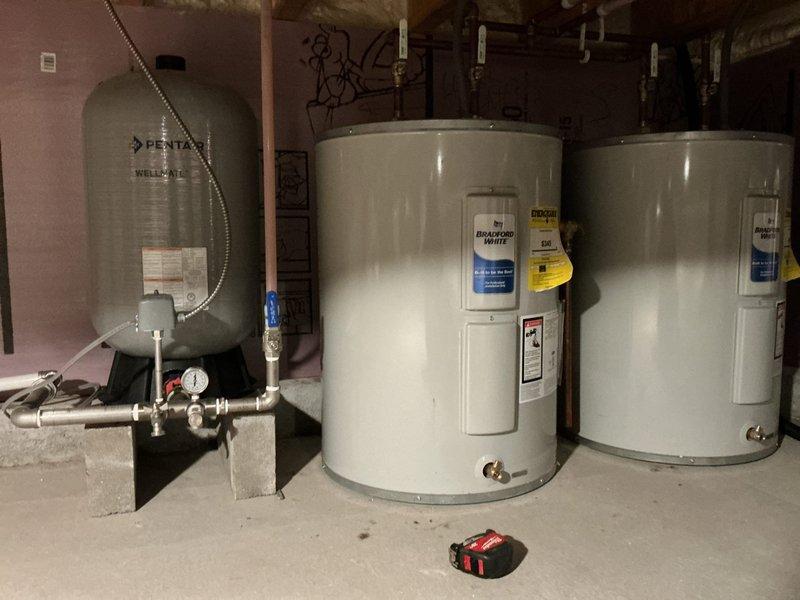 Conducted comprehensive water testing and provided detailed plumbing project estimate for installation of new whole-house water filtration system and water softener in residential basement utility area. Assessed existing plumbing infrastructure including Pentair well-mate pressure tank, water heaters, and current piping configuration to determine optimal placement and integration points for proposed treatment equipment. Documented existing conditions through photographic records showing basement mechanical systems, concrete foundation with foam insulation, exposed floor joists, PVC drainage lines, and copper supply piping to support equipment specifications and installation planning requirements.