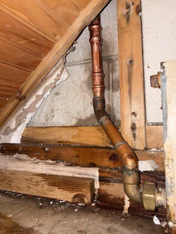 Responded to service call for depressurized Bosch aluminum boiler system. Upon arrival, discovered system had lost pressure due to a nail hole in copper piping that the homeowner had attempted to repair. Inspected the affected copper piping sections in the basement utility area, identifying the compromised connection points and assessing the extent of the damage. Performed necessary repairs to the damaged copper pipe section, ensuring proper sealing and structural integrity of the plumbing connections. Refilled system with appropriate antifreeze solution to manufacturer specifications. Pressurized the boiler system to proper operating levels and conducted thorough leak testing to verify repair integrity. System restored to full operational status with proper pressure maintained throughout testing period.