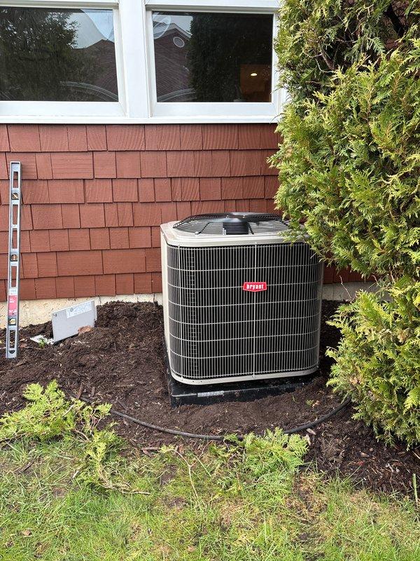 Completed full HVAC system replacement in basement utility area. Removed and disposed of existing furnace and air conditioner unit. Installed new Bryant 2-stage furnace with variable speed ECM blower motor and 14.3 SEER2 condenser unit on outdoor pad. Installation included cased evaporator coil, new line set, and sheet metal transitions. Reconnected gas line, PVC intake and exhaust venting, condensate lines with safety overflow and wet switches, and all electrical connections. Reused existing thermostat. Obtained necessary permits and inspections. System tested and operational.