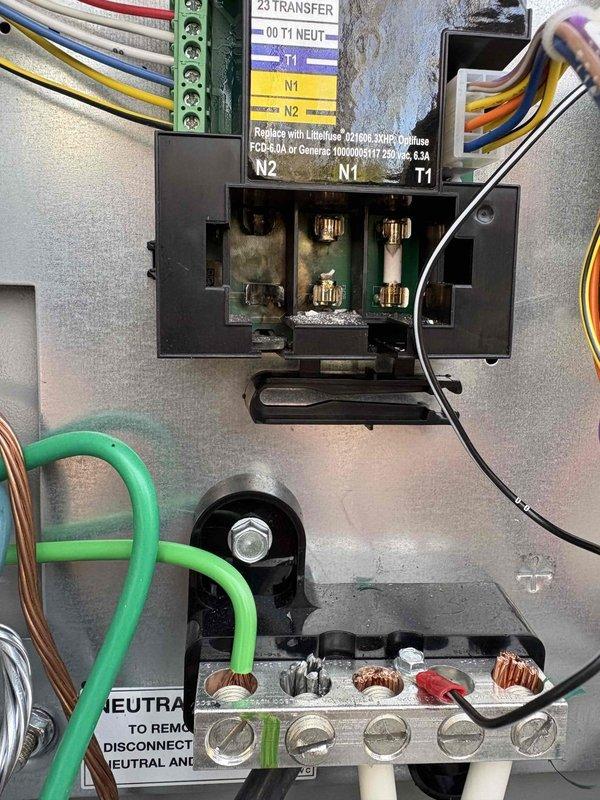 Responded to emergency service call for Generac 14kW generator failure following electrical storm and power outage. Upon arrival, performed comprehensive diagnostic inspection of generator and automatic transfer switch system. Inspection revealed significant electrical damage to transfer switch components, including severe corrosion and oxidation on main contactor terminals and bus bar connections. 

Documented extensive heat damage and discoloration on brass terminal screws of primary electrical connector, indicating arcing or overheating event likely caused by electrical storm surge. Removed and inspected control board, which showed signs of potential circuit damage. Photographed damaged components including corroded transfer switch contacts, compromised neutral bus bar connections, and affected control circuitry for warranty documentation and repair assessment.

Evaluated complete electrical distribution system within transfer switch enclosure, examining all wire terminations, groun