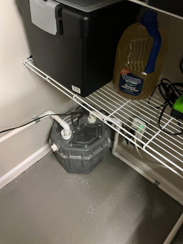 Completed furnace estimate for residential property, evaluating existing HVAC system located in mechanical room with white wall-mounted unit. Assessed installation conditions including existing plumbing infrastructure, electrical connections, and available space for potential equipment replacement or upgrade.