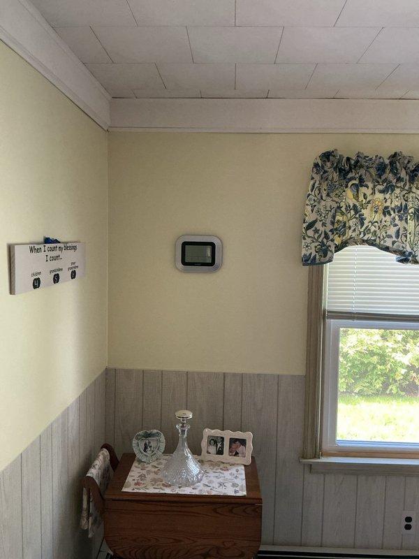 Conducted on-site evaluation for mini-split air conditioning system installation in residential property featuring vaulted ceilings and extensive window configuration. Assessed room layout, existing thermostat placement, and structural considerations for optimal equipment placement and refrigerant line routing. Documented interior conditions and provided estimate for ductless HVAC solution.