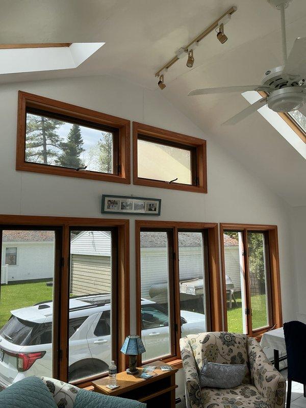 Conducted on-site evaluation for mini-split air conditioning system installation in residential property featuring vaulted ceilings and extensive window configuration. Assessed room layout, existing thermostat placement, and structural considerations for optimal equipment placement and refrigerant line routing. Documented interior conditions and provided estimate for ductless HVAC solution.