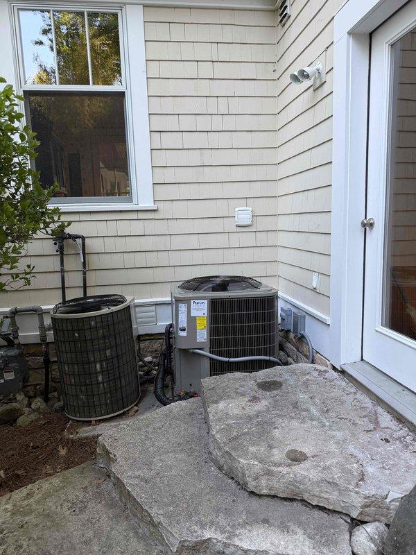 Removed and disposed of existing air conditioning condenser and evaporator coil from residential property. Installed new Bryant 14.3 SEER2 AC system including outdoor condenser unit on concrete pad and new cased evaporator coil, completing full system replacement with all refrigerant lines and electrical connections properly configured and tested for operation.