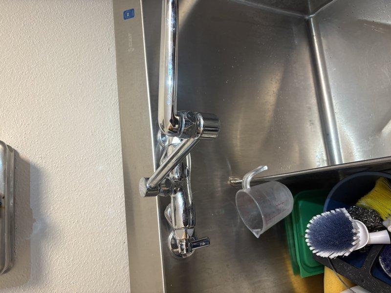 Responded to service call for multiple plumbing issues throughout the residence. Replaced faulty cartridge in laundry sink faucet that required excessive force to operate shut-off handles. Inspected and replaced leaking hot side cartridge in master bathroom sink faucet; replaced both hot and cold cartridges to ensure balanced performance and longevity. Addressed master bathroom toilet with malfunctioning flush valve that was intermittently cycling on and off; repaired flush valve mechanism to restore proper operation. Inspected and repaired minor weep leak at drain overflow connection fitting in downstairs master bathroom sink, where water was seeping from the back of the fitting where overflow line connects to main drain assembly. Evaluated water softener system for excessive salt usage. All fixtures tested and confirmed operational upon completion. Documented repairs with photographs for service records.