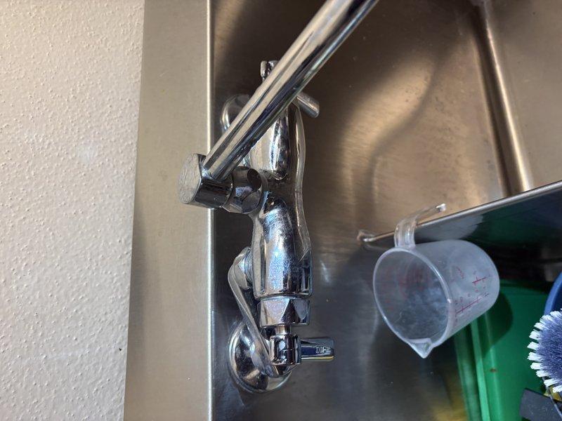 Responded to service call for multiple plumbing issues throughout the residence. Replaced faulty cartridge in laundry sink faucet that required excessive force to operate shut-off handles. Inspected and replaced leaking hot side cartridge in master bathroom sink faucet; replaced both hot and cold cartridges to ensure balanced performance and longevity. Addressed master bathroom toilet with malfunctioning flush valve that was intermittently cycling on and off; repaired flush valve mechanism to restore proper operation. Inspected and repaired minor weep leak at drain overflow connection fitting in downstairs master bathroom sink, where water was seeping from the back of the fitting where overflow line connects to main drain assembly. Evaluated water softener system for excessive salt usage. All fixtures tested and confirmed operational upon completion. Documented repairs with photographs for service records.