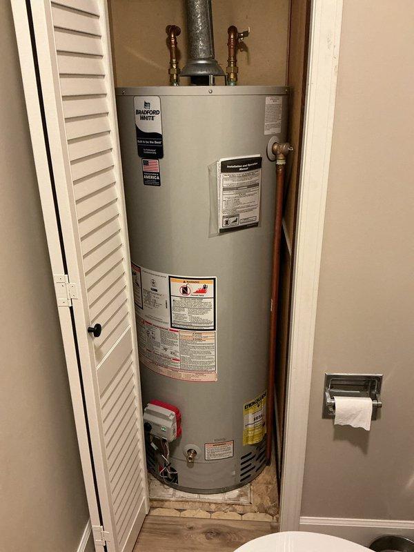 Completed installation of three major plumbing systems at residential property. Installed new 1/2 horsepower sump pump with check valve to prevent water backup. Replaced existing water heater with Bradford White 50-gallon tall conventional vent propane unit, including all necessary connections and venting. Installed Sterling Fest series FEST45 water treatment system combining water softener and tannin removal capabilities in utility room adjacent to laundry area. All systems tested and operational upon completion.