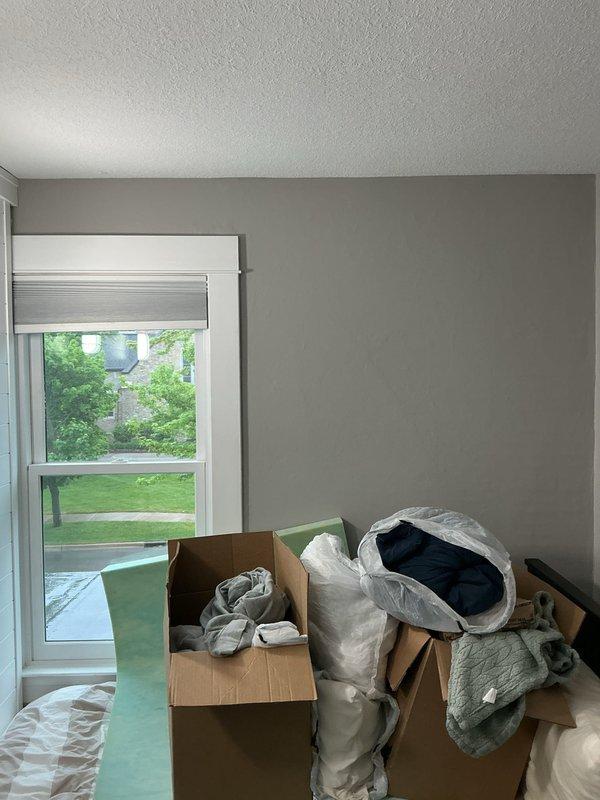Completed estimate for central air conditioning installation in home currently relying on window units for upstairs cooling. Assessed existing electrical panel capacity and interior spaces to determine equipment requirements and installation feasibility for adding a complete HVAC system.