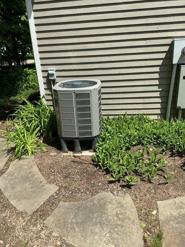 Conducted on-site evaluation of existing air conditioning system and provided comprehensive estimate for heat pump replacement. Assessed current outdoor condenser unit condition, electrical service capacity, and installation requirements. Documented equipment specifications, surrounding landscape conditions, and necessary electrical modifications for heat pump conversion.