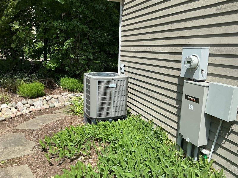 Conducted on-site evaluation of existing air conditioning system and provided comprehensive estimate for heat pump replacement. Assessed current outdoor condenser unit condition, electrical service capacity, and installation requirements. Documented equipment specifications, surrounding landscape conditions, and necessary electrical modifications for heat pump conversion.
