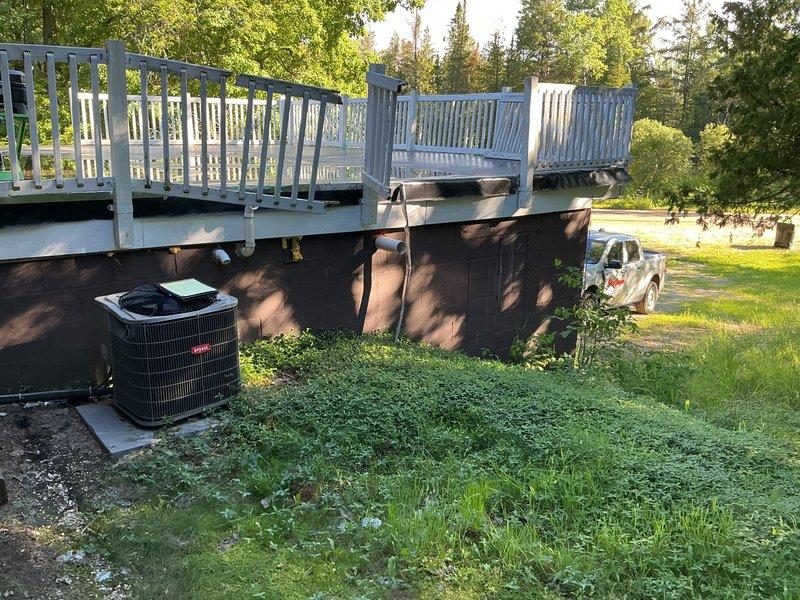 Conducted sales estimate for air conditioning system replacement. Existing condenser unit sustained ice damage and requires full replacement. Customer opted to replace the 410A refrigerant condenser rather than pursue repairs. Evaluated current outdoor condenser unit showing weathering and age-related deterioration in addition to ice damage. Assessed installation site conditions including concrete pad placement, clearances, and accessibility for equipment replacement. Documented equipment specifications and site conditions to provide accurate replacement estimate for new condenser unit installation.