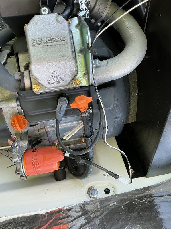 Completed scheduled preventive maintenance tune-up on Generac standby generator unit. Performed comprehensive inspection of engine components, verified proper operation of cooling fan assembly, checked all fluid levels and replaced engine oil and filter. Inspected fuel system components including fuel filter and lines for proper condition and secure connections. Verified all electrical connections, battery condition, and control system functionality. Cleaned unit interior, checked mounting hardware for tightness, and documented system condition with photos showing engine assembly, cooling system, and internal component layout.