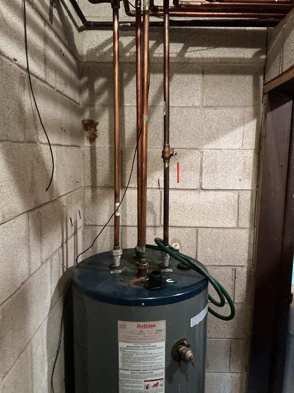 Conducted on-site assessment for boiler replacement estimate. Evaluated existing heating system infrastructure, including electrical panel configuration and current water heater installation, to determine compatibility requirements and necessary modifications for new boiler system installation.