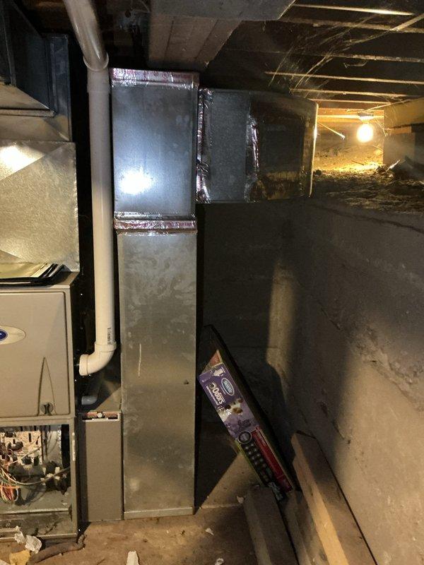 Conducted on-site evaluation for residential air conditioning installation in home currently equipped with heating only. Assessed existing basement HVAC infrastructure including furnace unit, ductwork system, and available space for AC equipment integration. Documented current system configuration showing metal supply ductwork, plumbing infrastructure with pressure gauges, and crawl space accessibility for installation work. Evaluated electrical service capacity, condensate drain routing options via existing PVC piping, and determined optimal placement for indoor air handler and outdoor condensing unit. Provided comprehensive estimate for complete central air conditioning system installation utilizing existing duct infrastructure where applicable.