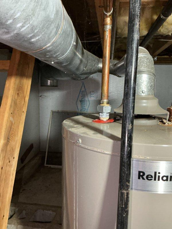Conducted comprehensive site assessment for complete boiler replacement estimate at residential property. Evaluated existing hydronic heating system including aging boiler unit and Reliance water heater with associated copper piping, gas lines, and venting infrastructure in basement utility area. Documented current equipment configuration, photographed mechanical connections, and assessed feasibility of multiple replacement options including modern boiler system installation versus alternative forced-air HVAC conversion, as well as potential integrated water heater replacement to optimize overall system efficiency and performance.