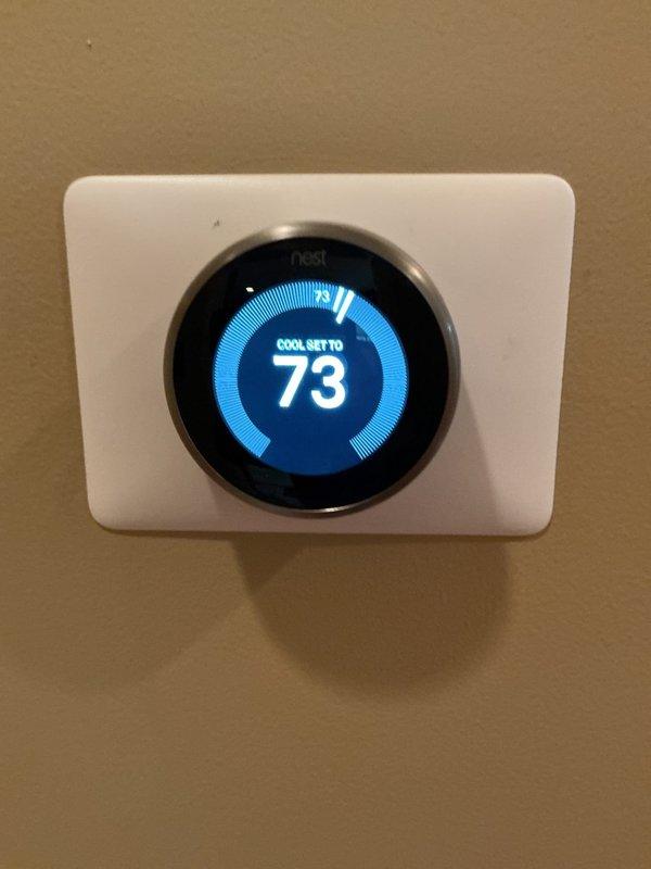 Completed comprehensive estimate for furnace and air conditioning system replacement at residential property. Evaluated existing HVAC equipment, electrical infrastructure including dual panel setup with conduit runs, and current Nest thermostat configuration set to 73°F cooling mode. Documented all equipment specifications and provided replacement recommendations to homeowner.