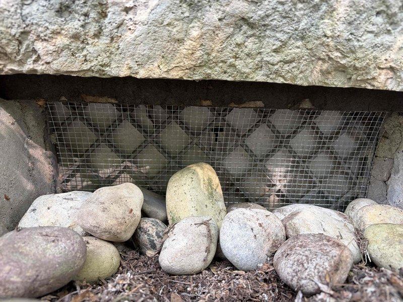 Responded to service call for carbon monoxide alarm inspection and foundation vent screening installation. Installed fine mesh screening over crawl space foundation vents to prevent pest entry while maintaining proper ventilation, replacing gaps left from previous installation work. Verified proper screen fit and secure attachment to prevent animal intrusion. Conducted carbon monoxide level testing throughout the property to ensure safe readings and proper alarm function. All CO levels measured within normal safe parameters with no elevated readings detected.