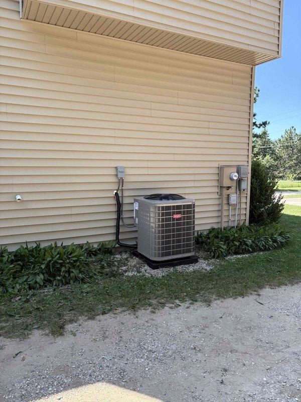Completed full HVAC system replacement including removal and disposal of existing furnace and air conditioning equipment. Installed new Bryant 2-stage gas furnace with deluxe variable speed blower motor (60%/40% burner staging, fan curve programming) and 16.5 SEER2 outdoor condensing unit on new pad with gravel base. Installed cased evaporator coil with new line set, safety wet and overflow switches, and PVC condensate drain with pump. Ran new PVC intake and exhaust venting through exterior wall. Fabricated and installed sheet metal transitions for proper airflow distribution. Reconnected natural gas line to new furnace burner assembly. Completed all electrical work including new breaker, circuit wiring, disconnect box, and whip connections to both indoor and outdoor units. Reused existing thermostat with system compatibility verification. All work performed to code with required permits obtained and inspections passed. System tested and confirmed operational with proper staging, airfl