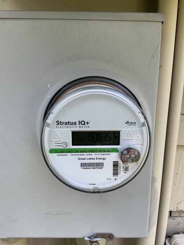 Conducted site assessment for standby generator removal estimate at unoccupied property. Documented existing electrical infrastructure including main service panels and exterior meter box. Evaluated generator connections to gas, electrical systems, and concrete pad for complete removal scope. Photographed electrical panel configuration and utility meter installation to determine disconnection requirements and permit considerations for generator decommissioning project.