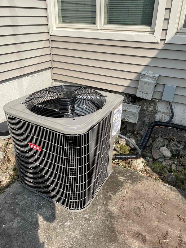 Completed full HVAC system replacement including removal and disposal of existing furnace and air conditioning equipment. Installed new high-efficiency furnace featuring 2-stage gas burner with variable speed blower motor (60%/40% modulation) and new 13.4 SEER2 outdoor condensing unit on concrete pad. Installation included cased evaporator coil, refrigerant line set, and all necessary sheet metal transitions for proper airflow distribution.

Established complete venting system using PVC intake and exhaust piping routed vertically through basement with proper terminations. Installed PVC condensate drain line with safety wet switch and overflow protection to prevent water damage. Reconnected existing natural gas supply line to new furnace with proper sizing and leak testing.

Completed all electrical work including new breaker installation, circuit wiring, outdoor disconnect, and electrical whip to condensing unit. Reused existing thermostat with reconnection to new equipment for system 