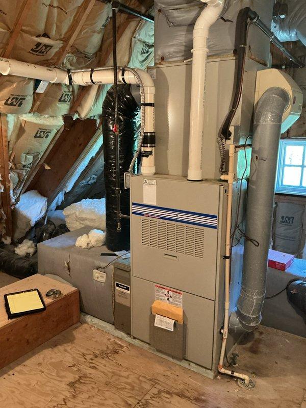 Conducted comprehensive assessment of existing residential air conditioning system including exterior condensing unit and interior furnace/air handler located in attic space. Documented current equipment configuration, refrigerant line routing with exposed insulation sections, condensate drainage system, and ductwork layout. Evaluated system placement, accessibility for service, and overall condition to provide accurate replacement estimate for single AC unit upgrade.