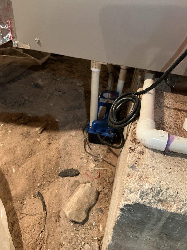 Completed annual cooling maintenance visit for both air conditioning and air handler systems. Inspected equipment located in crawl space area, verified proper operation of condensate pump with associated PVC drainage lines, and checked electrical connections. All systems operating within normal parameters, documented equipment condition with photos for service records.