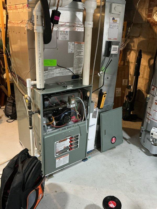 Completed comprehensive furnace super tune-up on residential gas-fired forced air heating system. Performed full system inspection including blower motor operation, electrical connections, gas pressure verification, heat exchanger examination, and combustion analysis. All components found operating within manufacturer specifications with no safety concerns identified. Cleaned blower assembly, checked and tightened electrical connections, verified proper thermostat operation, and tested limit and safety controls. System cycling properly with adequate airflow and temperature rise across heat exchanger. Provided assessment and quote for future ductwork extension project to add heating supply to second floor, including new trunk line installation and register placement recommendations. No immediate repairs required; unit functioning efficiently at time of service completion.