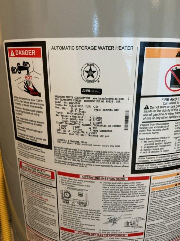 Performed comprehensive tune-up on Bradford White 50-gallon natural gas water heater (Model M2512T01, 40,000 BTU/H input) in response to odor concerns reported by occupant. Completed full system inspection including combustion chamber evaluation, burner assembly cleaning, flue baffle inspection, temperature and pressure relief valve testing, anode rod assessment, and verification of proper venting and gas connections. Discussed potential installation of flow tech anti-scale system as preventative measure for water quality improvement and extended equipment longevity.