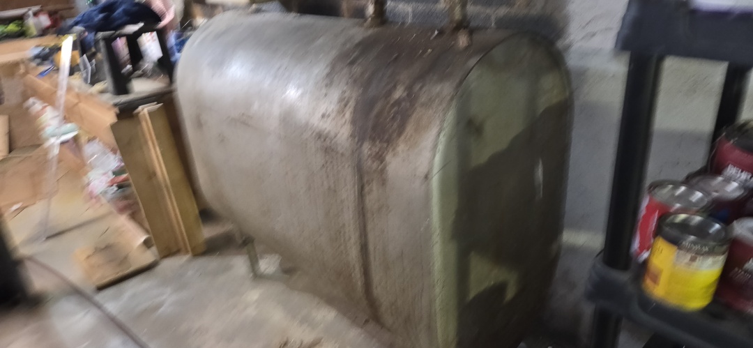Langhorne, PA - was able to purge system to get heat in 2 bedrooms. recommended spirovent and bladder expansion tank. Recommended replacing basement fuel oil tank as well. 