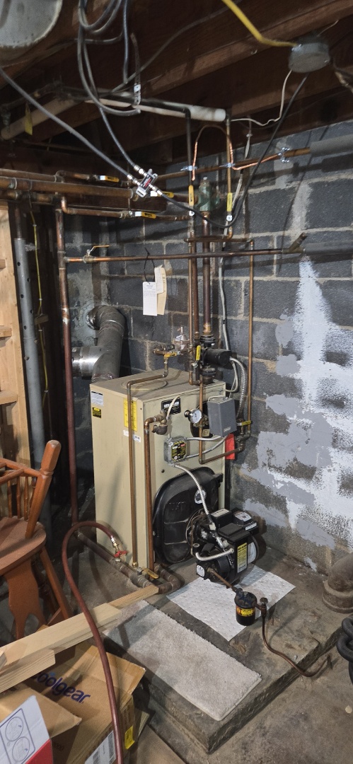 Langhorne, PA - was able to purge system to get heat in 2 bedrooms. recommended spirovent and bladder expansion tank. Recommended replacing basement fuel oil tank as well. 