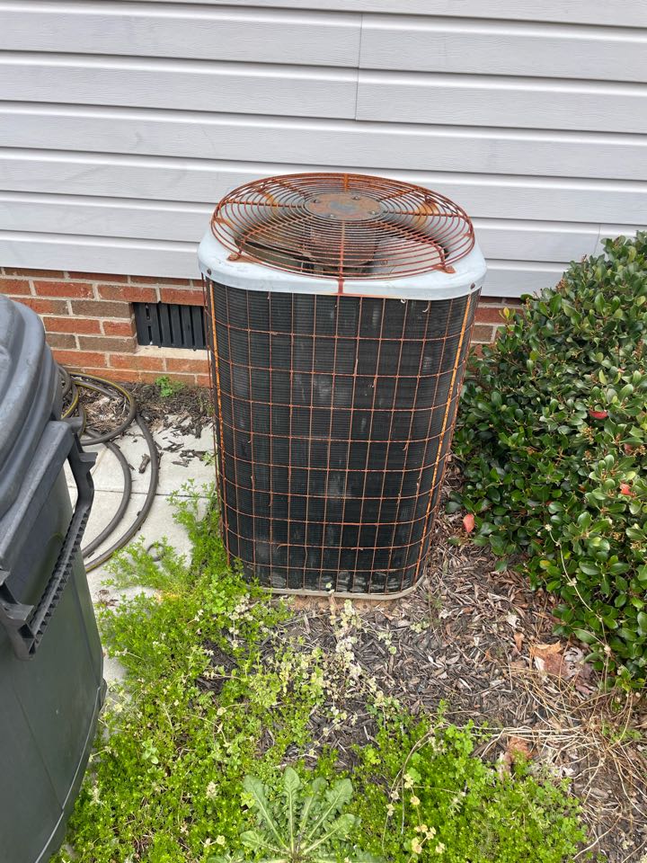 Performing service on a split system heat pump in Greenville