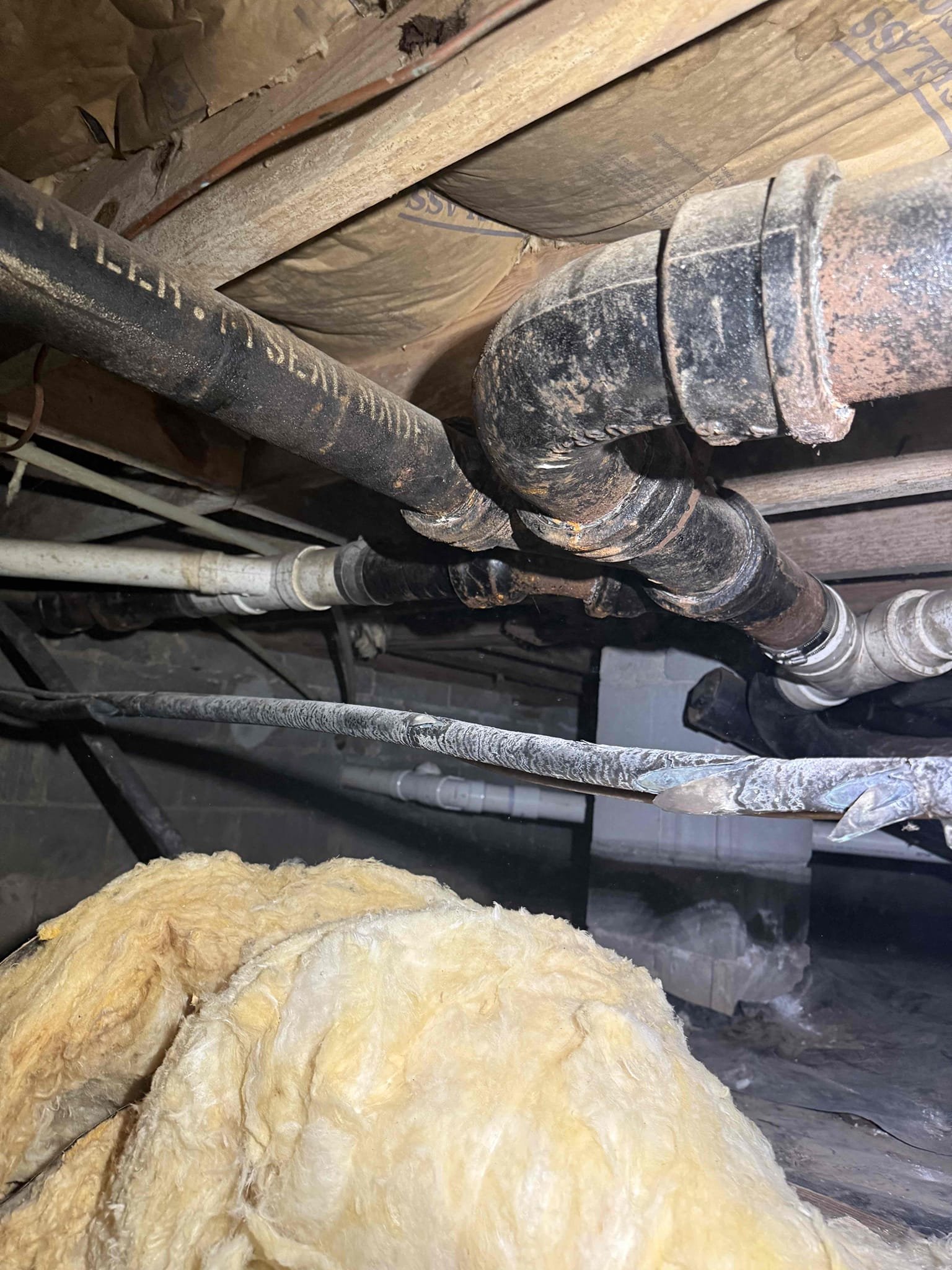 Customer was experiencing issue with laundry drain overflowing, tech ran snake to clear drain but warned there may be issues with drain due to old cast iron pipe. Snaked drain and pulled back some clumps of lint likely caught up in p-trap. Tested drain and found that drain would eventually back up really slowly, inspected drain in crawlspace and found a long run of 2” cast iron drain minimally sloped indicating line was likely to closed up and restricting flow. Wrote up quote to replace with PVC. Customer was experiencing issue with laundry drain overflowing, tech ran snake to clear drain but warned there may be issues with drain due to old cast iron pipe. Snaked drain and pulled back some clumps of lint likely caught up in p-trap. Tested drain and found that drain would eventually back up really slowly, inspected drain in crawlspace and found a long run of 2” cast iron drain minimally sloped indicating line was likely to closed up and restricting flow. Wrote up quote to replace with PVC.
