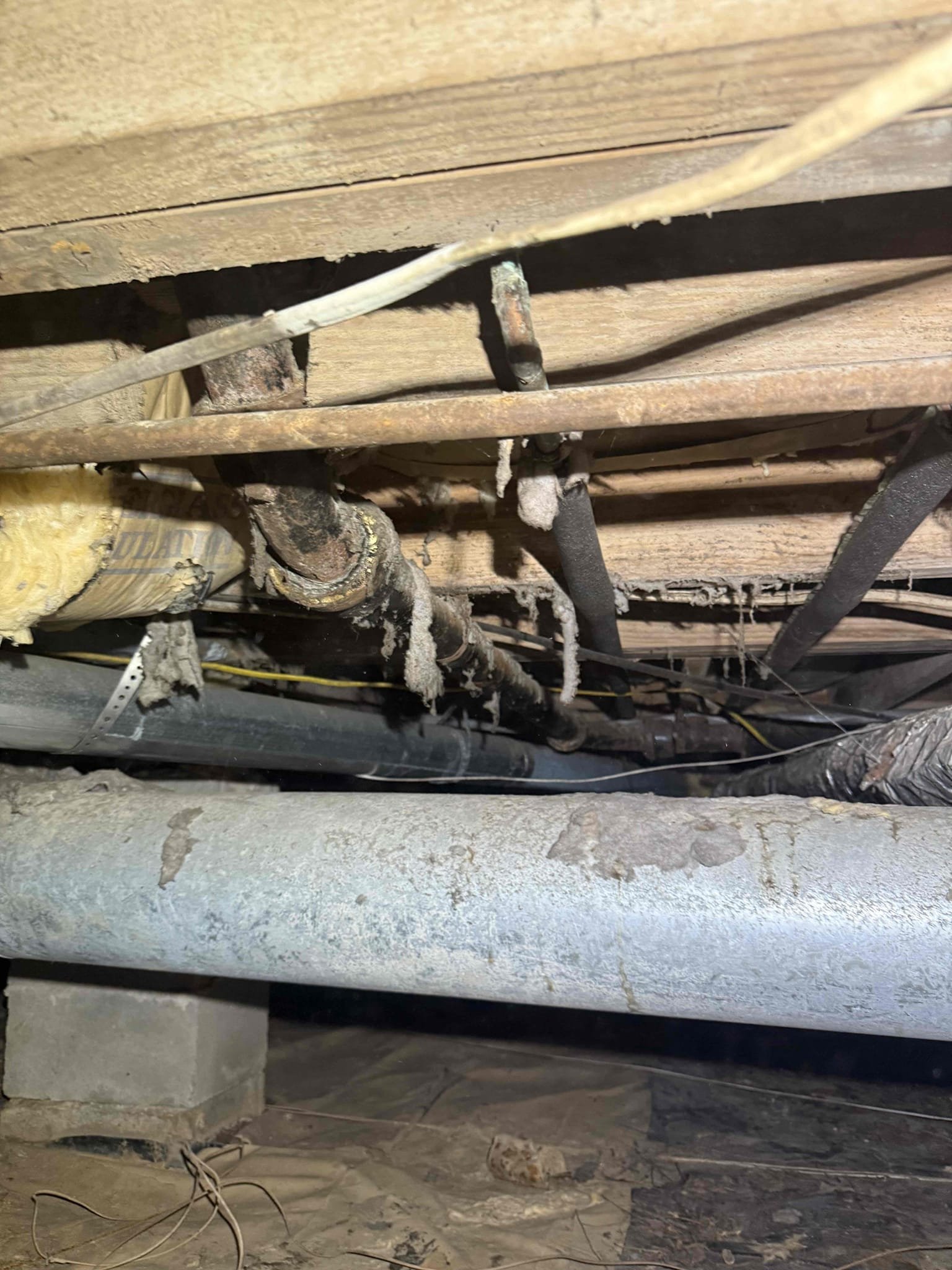 Customer was experiencing issue with laundry drain overflowing, tech ran snake to clear drain but warned there may be issues with drain due to old cast iron pipe. Snaked drain and pulled back some clumps of lint likely caught up in p-trap. Tested drain and found that drain would eventually back up really slowly, inspected drain in crawlspace and found a long run of 2” cast iron drain minimally sloped indicating line was likely to closed up and restricting flow. Wrote up quote to replace with PVC. Customer was experiencing issue with laundry drain overflowing, tech ran snake to clear drain but warned there may be issues with drain due to old cast iron pipe. Snaked drain and pulled back some clumps of lint likely caught up in p-trap. Tested drain and found that drain would eventually back up really slowly, inspected drain in crawlspace and found a long run of 2” cast iron drain minimally sloped indicating line was likely to closed up and restricting flow. Wrote up quote to replace with PVC.
