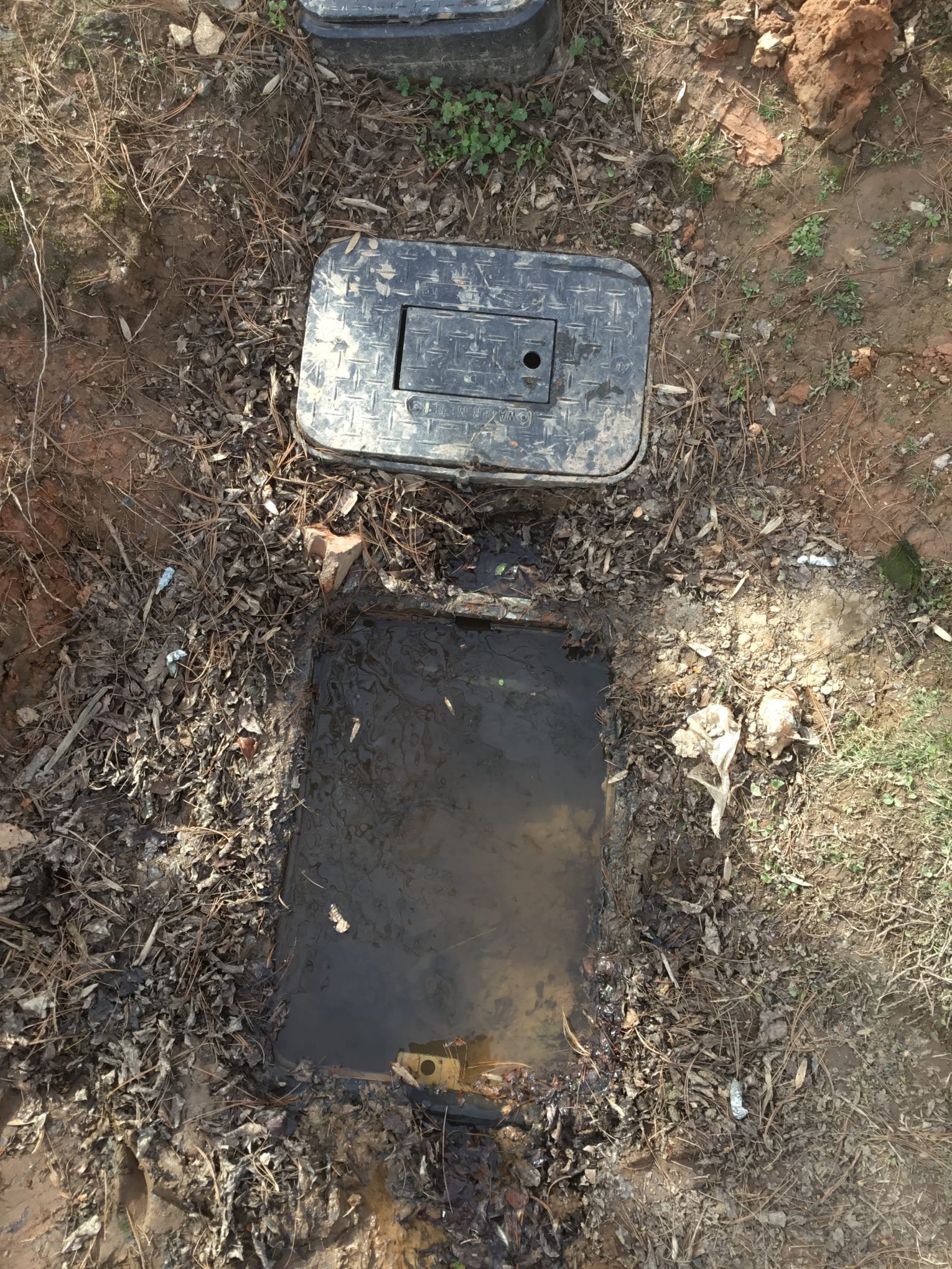 Payment: Check
Upon arrival at the residence, I conducted an initial investigation into potential underground leakage causing sinkholes in the concrete area located between the two buildings. The sinkhole is positioned centrally between both structures, suggesting the leak may originate from a shared main line or an individual service line from one of the buildings that is running continuously.
During the inspection, I found that the water meter for Building B (left side) is currently buried and inaccessible, though management reported a consistently high water bill for this unit, which strongly indicates a leak. Conversely, the water meter for Building A (right side) is currently registering usage due to an existing irrigation leak and a backflow preventer leak. Because of this constant flow, I am unable to verify if there is an additional secondary underground leak for Building A until the known surface leaks are repaired. Payment: Check
Upon arrival at the residence, I conducted an initial investigation into potential underground leakage causing sinkholes in the concrete area located between the two buildings. The sinkhole is positioned centrally between both structures, suggesting the leak may originate from a shared main line or an individual service line from one of the buildings that is running continuously.
During the inspection, I found that the water meter for Building B (left side) is currently buried and inaccessible, though management reported a consistently high water bill for this unit, which strongly indicates a leak. Conversely, the water meter for Building A (right side) is currently registering usage due to an existing irrigation leak and a backflow preventer leak. Because of this constant flow, I am unable to verify if there is an additional secondary underground leak for Building A until the known surface leaks are repaired.