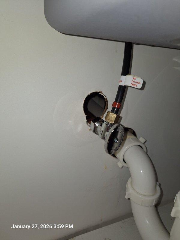 Repaired leaking water connection at customer's basement wet bar. Identified issue at the copper pipe junction with PVC line, which required replacement of deteriorated fitting. Installed new valve and secured all connections to prevent future leakage. Repaired leaking water connection at customer's basement wet bar. Identified issue at the copper pipe junction with PVC line, which required replacement of deteriorated fitting. Installed new valve and secured all connections to prevent future leakage.