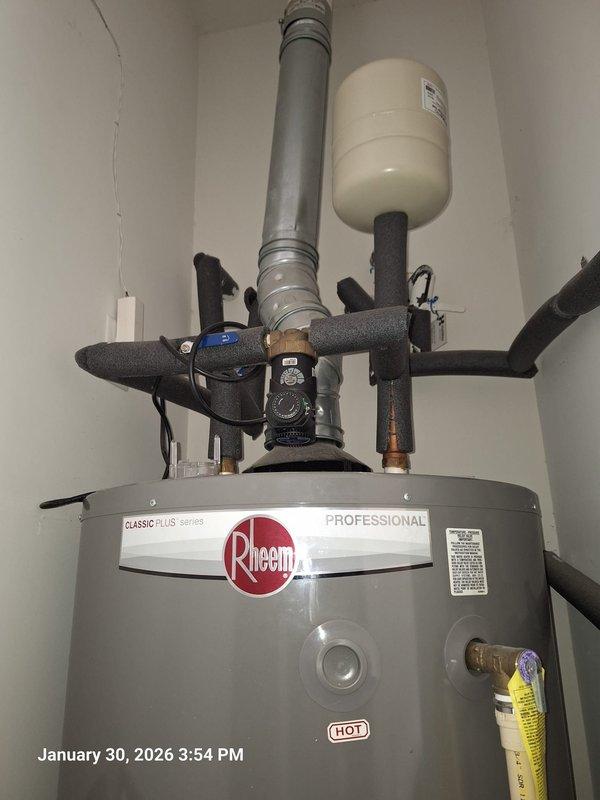 Responded to service call for Rheem Classic Plus Professional 73-gallon gas water heater producing constant humming noise. Inspected unit and associated plumbing components including expansion tank, pressure relief valve, and ventilation system. Resolved humming issue and verified proper operation of all water heater components. Responded to service call for Rheem Classic Plus Professional 73-gallon gas water heater producing constant humming noise. Inspected unit and associated plumbing components including expansion tank, pressure relief valve, and ventilation system. Resolved humming issue and verified proper operation of all water heater components.