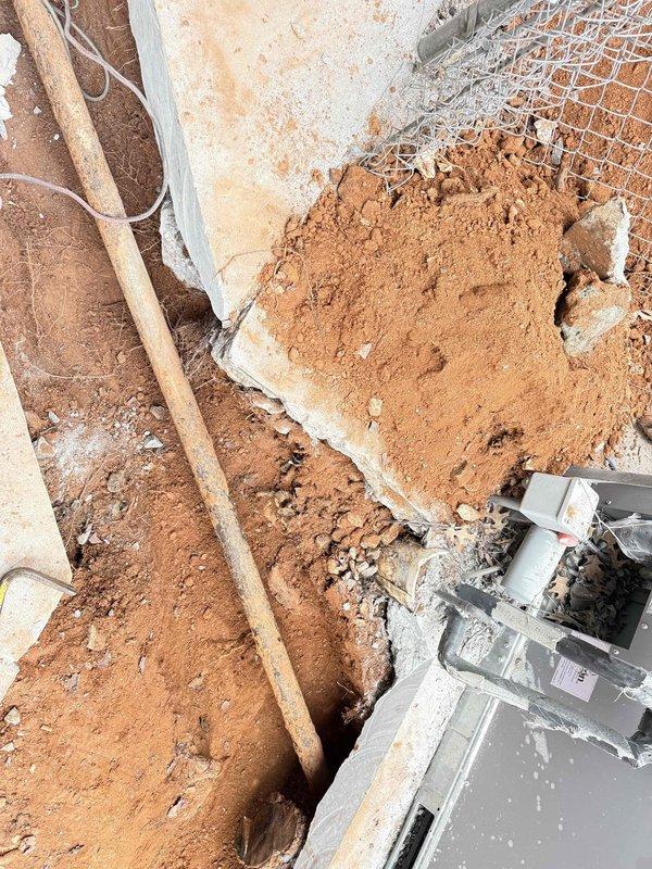 Replaced corroded gas supply line from meter to property following confirmed leak. Excavated access point through concrete as previously prepared by customer, and installed new gas line to restore safe service. Replaced corroded gas supply line from meter to property following confirmed leak. Excavated access point through concrete as previously prepared by customer, and installed new gas line to restore safe service.